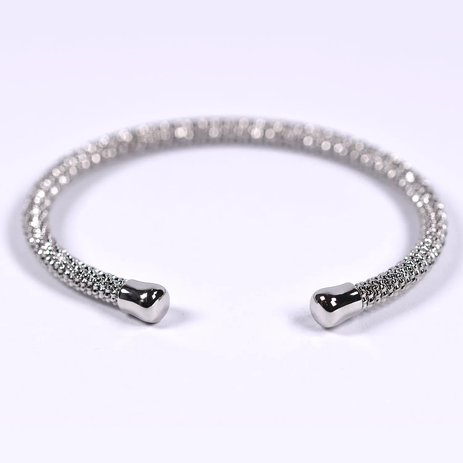 Detailed open rhodium bangle
