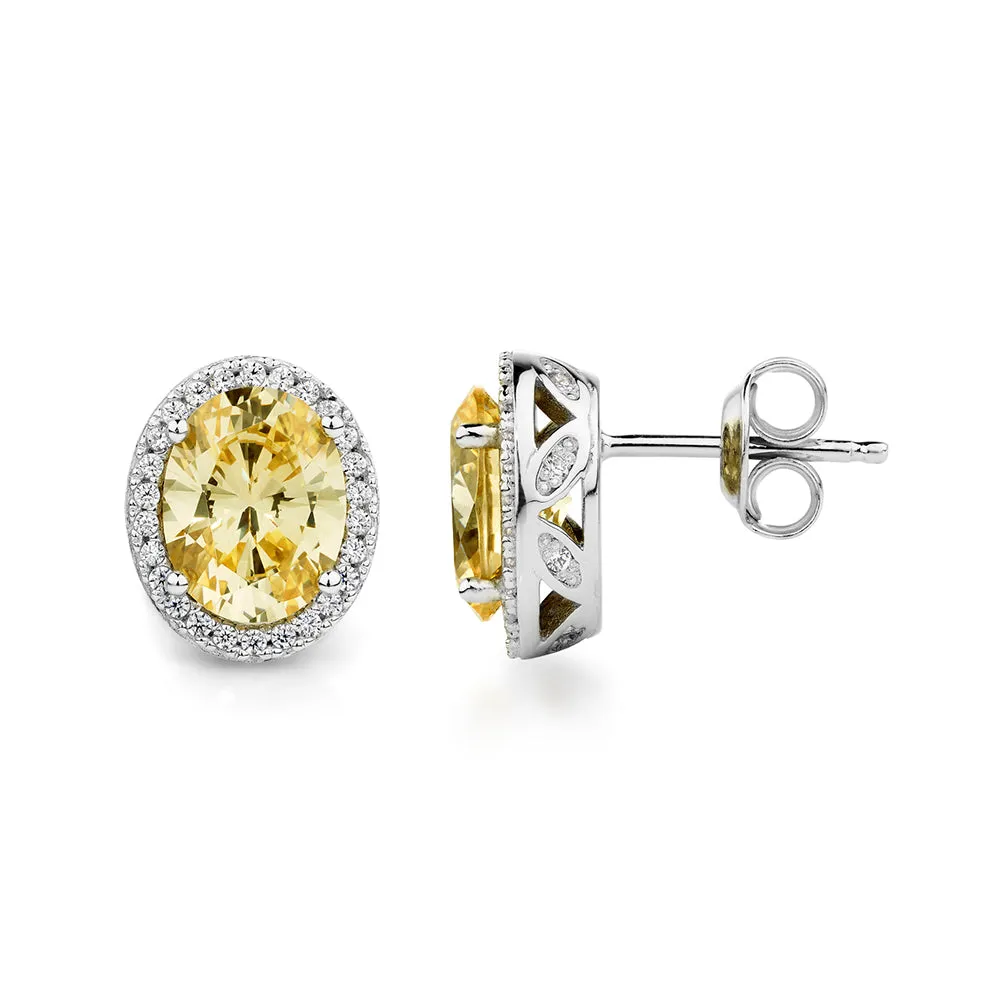 Oval and Round Brilliant halo stud earrings with 4.06 carats* of diamond simulants in sterling silver