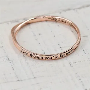 "Even though you are far away, you are in my thoughts every