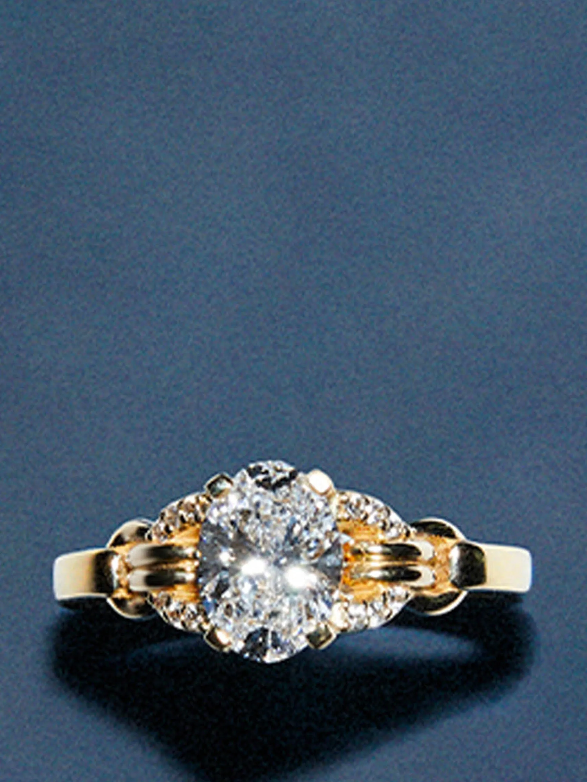 Signature oval cut buckle ring