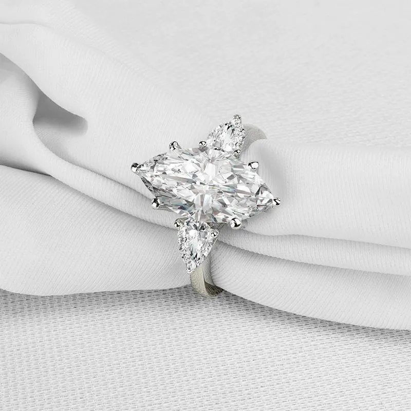 Three Stone Marquise Created Engagement Ring